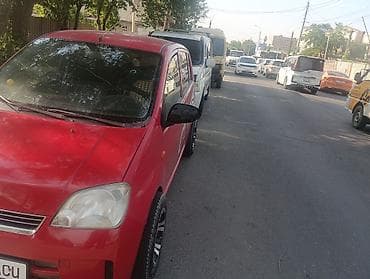 лифтбек: Daihatsu Cuore: 2004 г., 1 л, Механика, Бензин, Лифтбек — 3