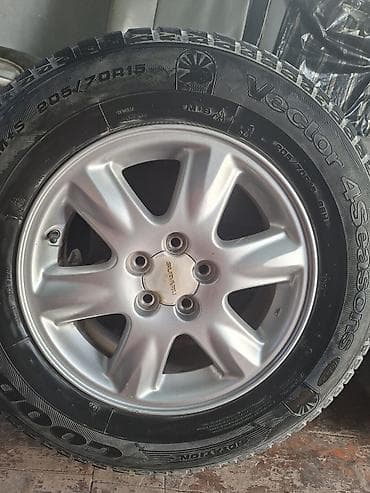 5: Комплект колес Subaru на дисках + всесезонные шины Goodyear - Диски — 2