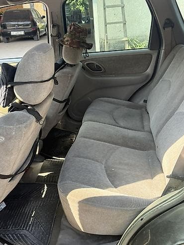 форестер 2001: Mazda Tribute: 2001 г., 2 л, Автомат, Бензин, Кроссовер — 4