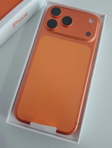 Аудиотехника: Яркий оранжевый iPhone в коробке. Особенности: - Корпус в редком — 1