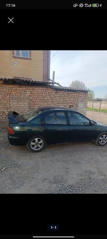 mazda 3: Mazda 323: 1996 г., 1.8 л, Механика, Седан — 2