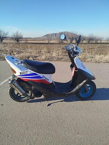 Скутеретта Honda, 70 куб. см, Бензин