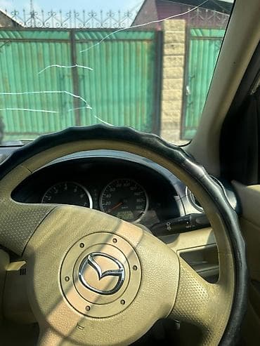 mini kuper: Mazda Demio: 2004 г., 1.5 л, Автомат, Бензин, Хэтчбэк — 7