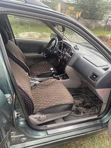 королла 120 салон: Nissan Primera: 2002 г., 1.8 л, Механика, Бензин, Универсал — 10