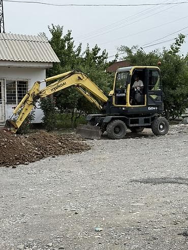 Экскаватор-погрузчик Hyundai Robex 60W-9 на колесном ходу - Колесная at lalafo.kg Экскаватор-погрузчик Hyundai Robex 60W-9 на колесном ходу - Колесная