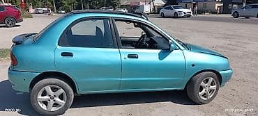 мазда мышка: Mazda 121: 1992 г., 1.3 л, Механика, Бензин, Седан — 5