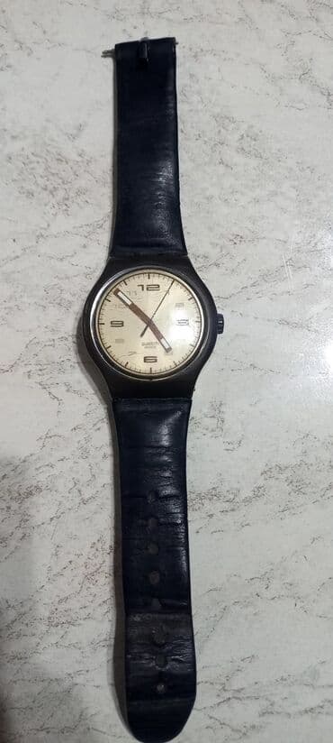 Швейцарские часы. Цена 2500