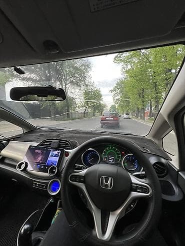 mini ev: Honda Fit: 2012 г., 1.3 л, Вариатор, Гибрид, Хэтчбэк — 6