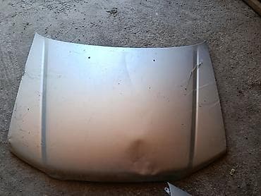 step: Кузовные запчасти на Subaru Forester (на фото): - Капот серебристый — 1