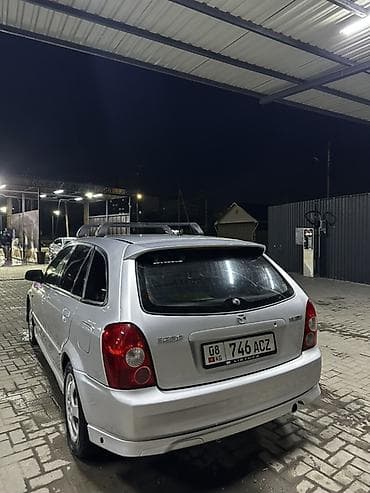 кондидер: Mazda 323: 2002 г., 2 л, Механика, Бензин, Хэтчбэк — 6