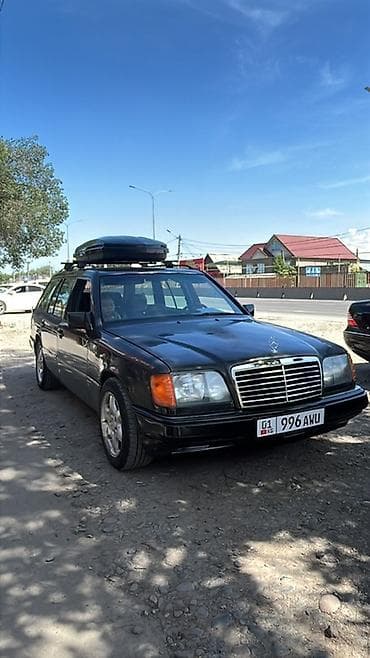 значок от мерса: Mercedes-Benz W124: 1995 г., Универсал — 1