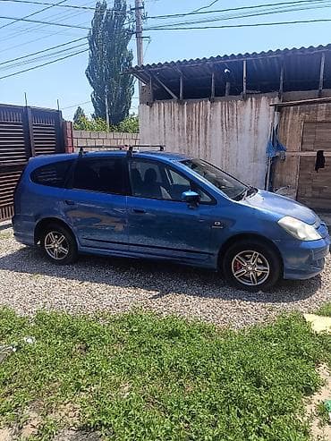 повреждённый автомобиль: Honda Stream: 2003 г., 1.7 л, Автомат, Бензин, Минивэн — 10