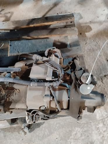 раздатка на ниву: Раздаточная коробка Mitsubishi Pajero IO H76W 2003 (б/у) — 1