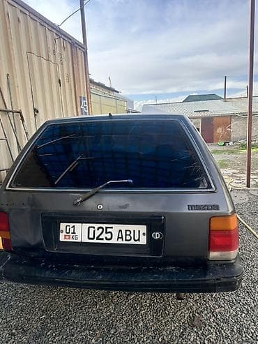 mersedes e212: Mazda 323: 1988 г., 1.5 л, Универсал — 1