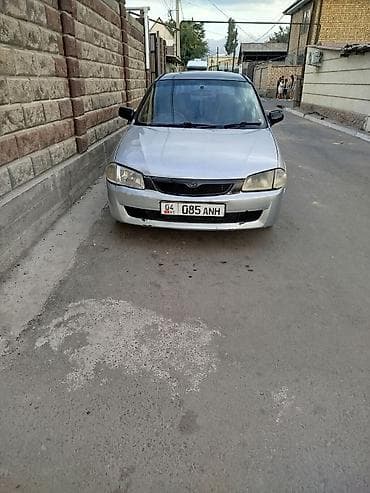 2000: Mazda 323: 1999 г., Механика, Бензин, Универсал — 1