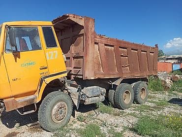 Транспорт: Самосвал CAMC (кабина с надписью STEYR), 6x4. Особенности: - Колесная — 3
