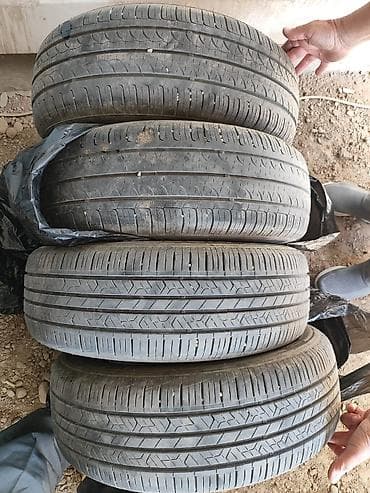 Комплект из 4 летних шин 195/65 R15 91T. Продаю в связи с тем что