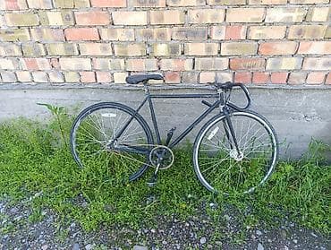 донголое: Рабочий, на ходу. Бир донгологу жарык жаматып алыш керек — 1