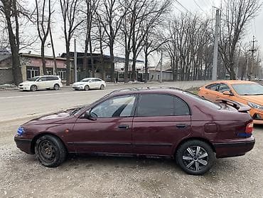 Транспорт: Toyota Carina E: 1995 г., 2 л, Кол менен иштөөчү, Бензин, Седан — 7