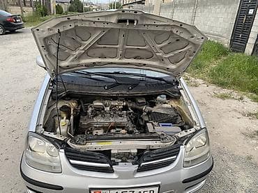 Nissan Almera Tino: 2003 г., 1.8 л, Механика, Бензин, Хэтчбэк — 7