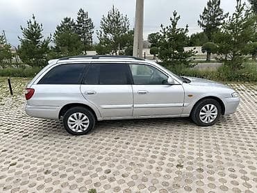 1 mz: Mazda 626: 2000 г., 2 л, Механика, Газ, Универсал — 4