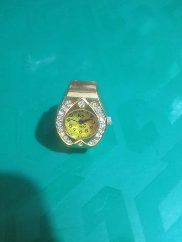 электронные часы браслет: Продаю часы-кольцо. На батарейке. Ремешок растягивается. Позолоченные — 3