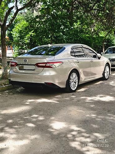 byd e7: Toyota Camry: 2019 г., 2.5 л, Вариатор, Гибрид, Седан — 5