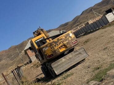 покрышка на погрузчик цена: Экскаватор, Колесный — 10