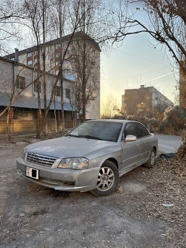 шипованные шины б у: Kia Magentis: 2001 г., 2 л, Механика, Газ, Седан — 2