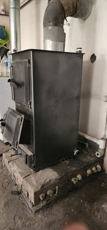 хлебопекарная печь: Твердотопливный котел отопления (стальной) Описание: - Тип: напольный — 3