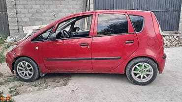 круглый: Mitsubishi Colt: 2006 г., 1.3 л, Механика, Бензин, Хэтчбэк — 5