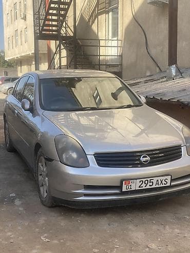 mazda 323 2003: Nissan Skyline: 2003 г., Автомат, Седан — 1