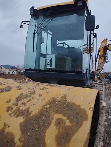 Транспорт: Вибрационный дорожный каток SHANTUI. Основные характеристики: - — 1