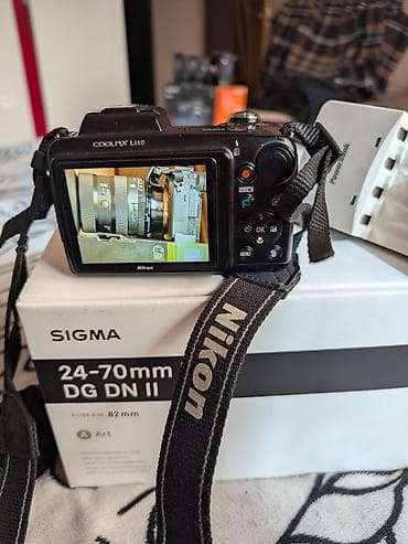 nikko: Фотоаппарат Nikon Coolpix L110 + комплект аккумуляторов и зарядное — 4