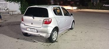 byd e7: Toyota Vitz: 2001 г., 1.3 л, Автомат, Бензин, Хэтчбэк — 4