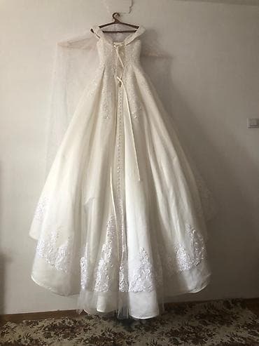 Прокат одежды: Свадебное платье (Италия) Цвет: Айвори. Фасон: Открытые плечи, есть — 5