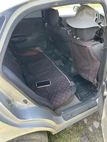 газ 69: Mazda 626: 1999 г., 1.8 л, Бензин, Седан — 9