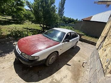 Транспорт: Mazda 626: 1992 г., 2 л, Механика, Бензин, Лифтбек — 5