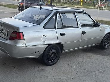 т 82: Daewoo Nexia: 2009 г., 1.5 л, Кол менен иштөөчү, Бензин, Седан — 4