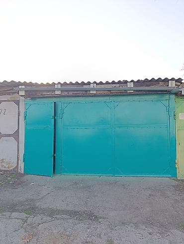 Унаа токтоочу жайлар: Гараж из капитальных стен с распашными металлическими воротами — 9