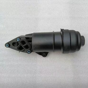 блок управления климат контроля: Ауди А6 С6 корпус масляного фильтра — 1