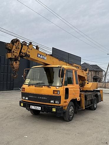 цистерну 16 кубов: Автокран, Nissan, 1994 г., 21 м — 1
