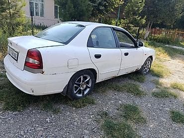 Daewoo Nubira: 2002 г., Механика, Бензин, Седан — 5