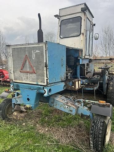 задний редуктор: Самоходная косилка-валкоукладчик - Ширина захвата жатки: около 3–4 м — 2