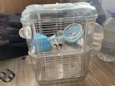 наполнитель для животных: Клетка для грызунов. Идет в комплекте с домом колесом и двумя поилками — 1