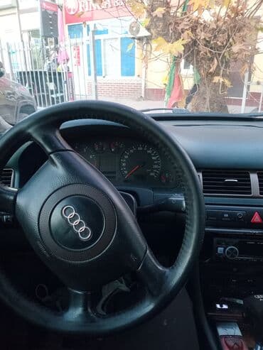 молочное оборудование: Audi A6: 1999 г., 2.4 л, Типтроник, Бензиновая, Седан — 7