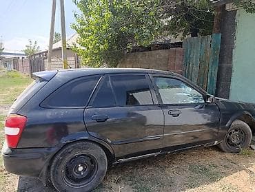 Mazda 323: 1998 г., Хэтчбэк — 2