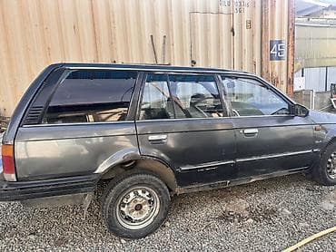 124 amg: Mazda 323: 1988 г., 1.5 л, Универсал — 2