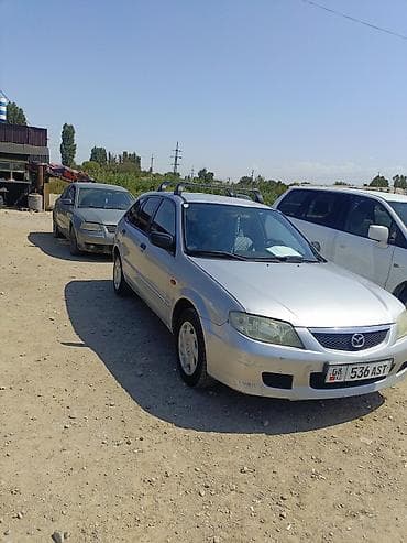 выбор номера о: Mazda 323: 2002 г., Механика, Бензин, Универсал — 2