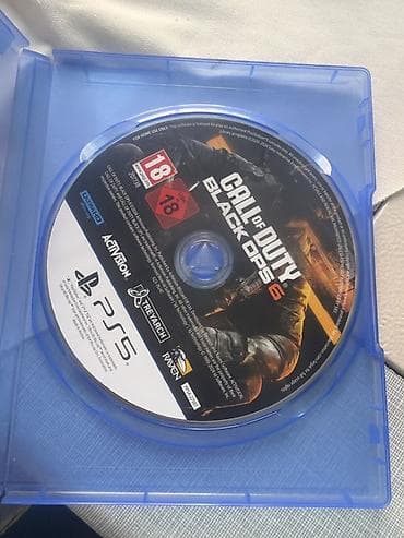 Диск с игрой Call of Duty: Black Ops 6 для PlayStation 5. - Формат
